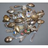 A quantity of assorted sterling flatware and assorted 800 gilt white metal commemorative spoons.
