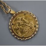 A gold full sovereign pendant, on 9ct chain.