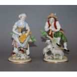 A pair of Sitzendorf porcelain figures of a shepherd and shepherdess, H 12cm