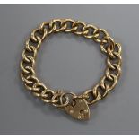 A heavy 9ct gold curb link bracelet, 41 grams.