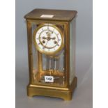 A late 19th century French brass cased eight day four glass mantel clock height 30cm