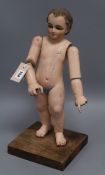 An early articulated artist's mannequin lay figure; with glass eyes, c.1860's, wooden mounted