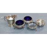 An Edwardian silver cream jug, London, 1909, a pair of Victorian silver bun slats and two other