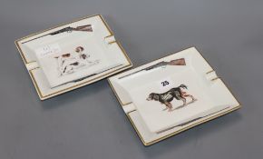 Hermes Paris. A pair of gun dog porcelain cigar ashtrays, 'water spaniel' and 'pack dog'