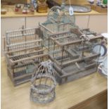 Five vintage Spanish wood and cane bird cages