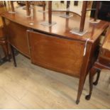 An Edwardian satinwood banded mahogany bow front sideboard W.122cm