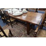 A 17th century style elm planked topped refectory table L.268cm