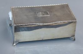 A 1930's silver cigarette box, with engine turned lid, 17.3cm.