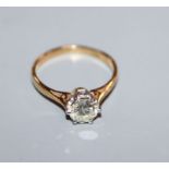An 18ct yellow metal and solitaire diamond ring, stone approximately 0.65 cts, size K.