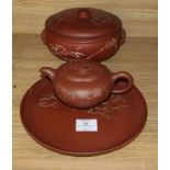 A Yixing pottery covered bowl and stand and a similar teapot Provenance - The owner and her family