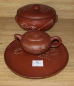 A Yixing pottery covered bowl and stand and a similar teapot Provenance - The owner and her family