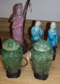 A pair of Chinese green quartz vases and covers, a pair of Chinese figures and a glass Guanyin