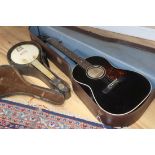 A Martin Coletti acoustic guitar and a John Grey banjo mandolin
