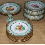 A 19th century dessert set with gilt border and floral centres