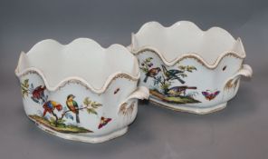 A pair of Helena Wolfsohn jardinieres, painted with birds of paradise and insects length 28cm