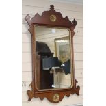 A George III style mahogany fret cut wall mirror H.106cm