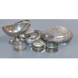 An Indian white metal embossed oval box, a Victorian silver salt and four other items.