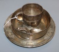 An early 20th century Tiffany & Co sterling three piece christening set, comprising a bowl on