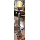 A Florentine style cast iron candle stand