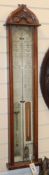 An Admiral Fitzroy oak barometer H.110cm