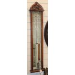 An Admiral Fitzroy oak barometer H.110cm