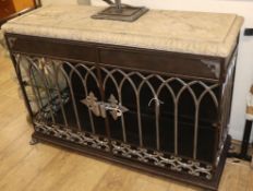 A black painted wrought iron two door cabinet with reconstituted stone leaf moulded top W.125cm
