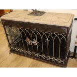 A black painted wrought iron two door cabinet with reconstituted stone leaf moulded top W.125cm