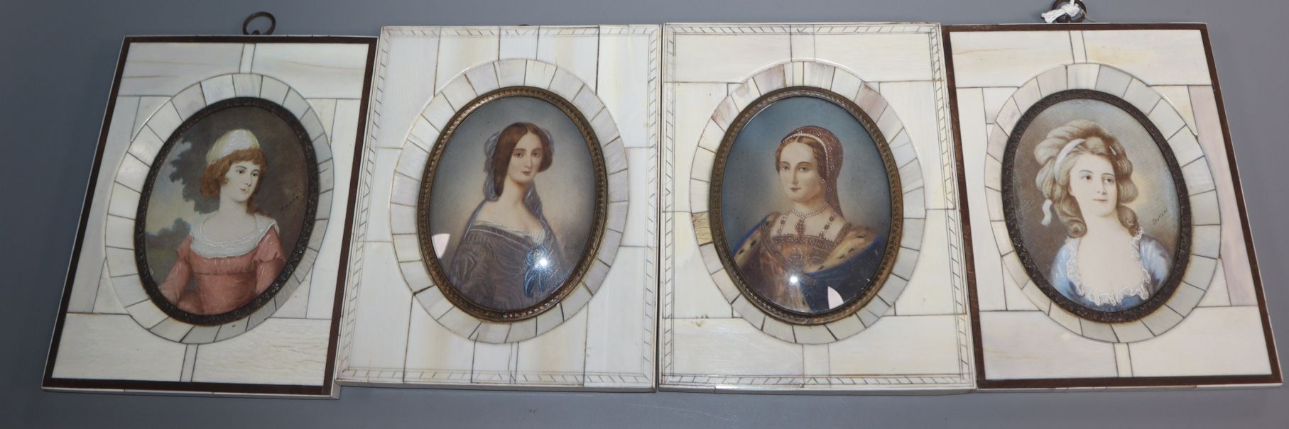 A set of four miniature portraits on ivory