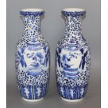 A pair of 19th century Chinese blue and white vases height 30cm