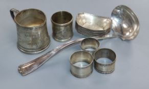 An American sterling mug, a set of twelve sterling salts and five plated items.
