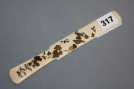A Japanese gilt lacquered ivory letter opener