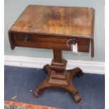 A George IV mahogany drop flap work table, on pillar and quadruple platform base W.54cm