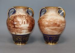 A pair of Doulton porcelain vases