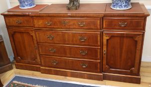 A reproduction 18th century design walnut breakfront sideboard W.184cm