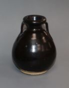 A Chinese black glazed pottery vase, Song / Yuan dynasty Provenance - The owner and her family lived