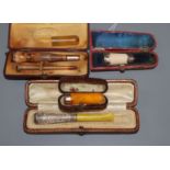 A collection of amber cigar and cigarette holders