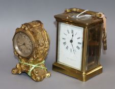 A carriage clock and a gilt timepiece