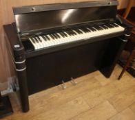 An Art Deco style ebonised Eavestaff mini piano W.130cm