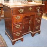 A George III mahogany kneehole desk W.80cm