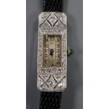 A lady's late 1920's 18ct white gold and diamond set rectangular cocktail watch, with cabochon