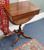 A Regency inlaid rosewood work table on tripod base W.51cm