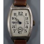 A gentleman's 1930's? Swiss 935 white metal manual wind wrist watch, with Arabic dial and subsidiary