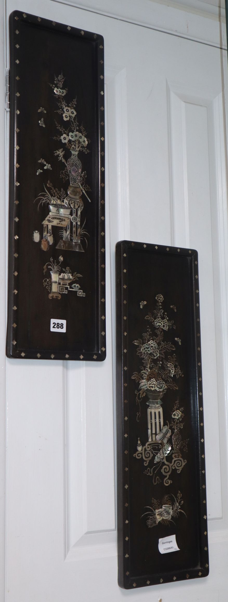 A pair of Chinese hongmu and mother of pearl inlaid panels, early 20th century Provenance - The