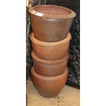 Four glazed earthenware garden planters Diam.33cm