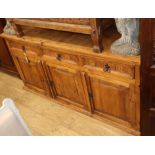 An olive wood dresser, fitted three drawers over panelled cupboards, W.168cm