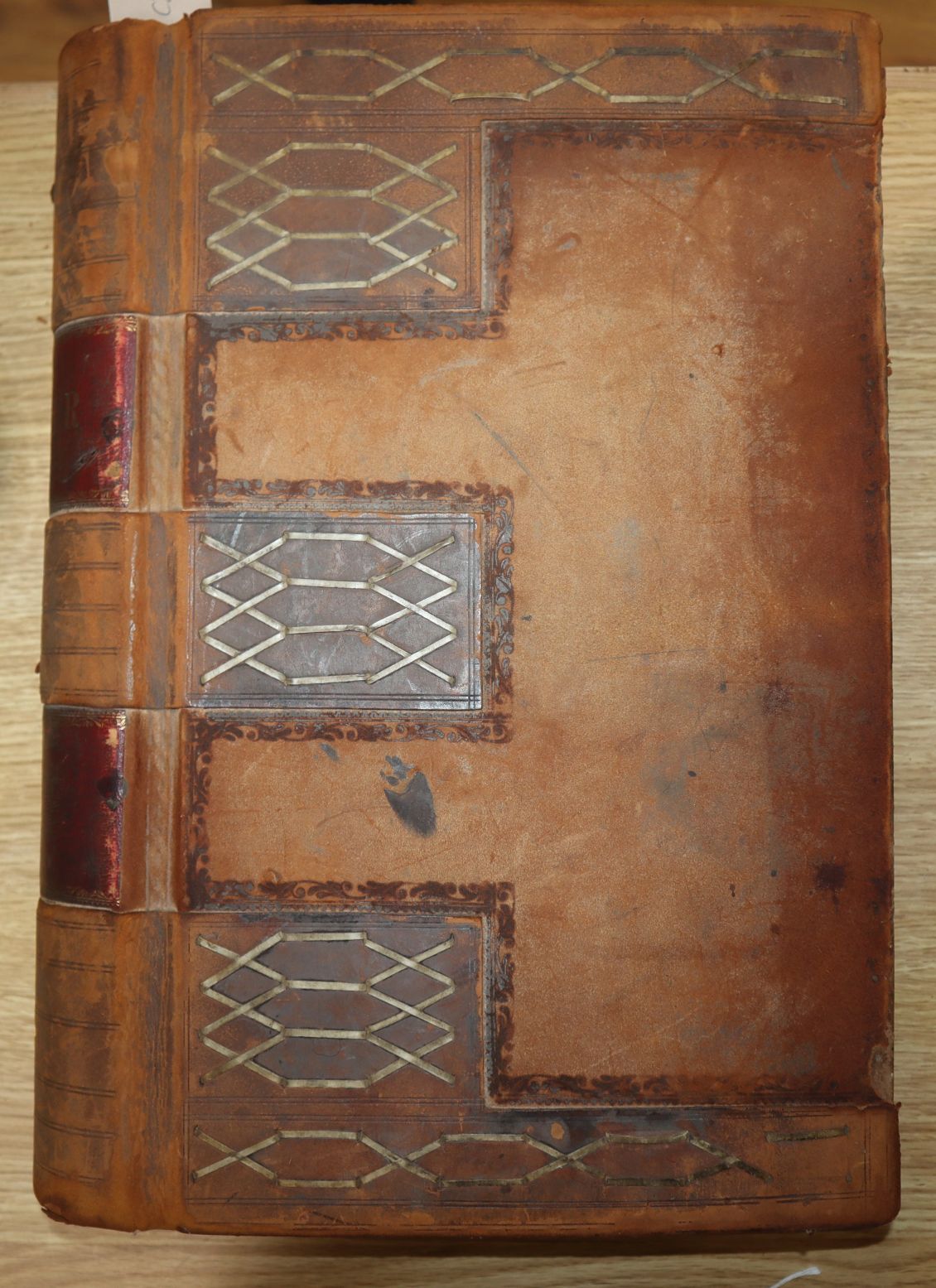 A leather bound ledger with references to Brighton