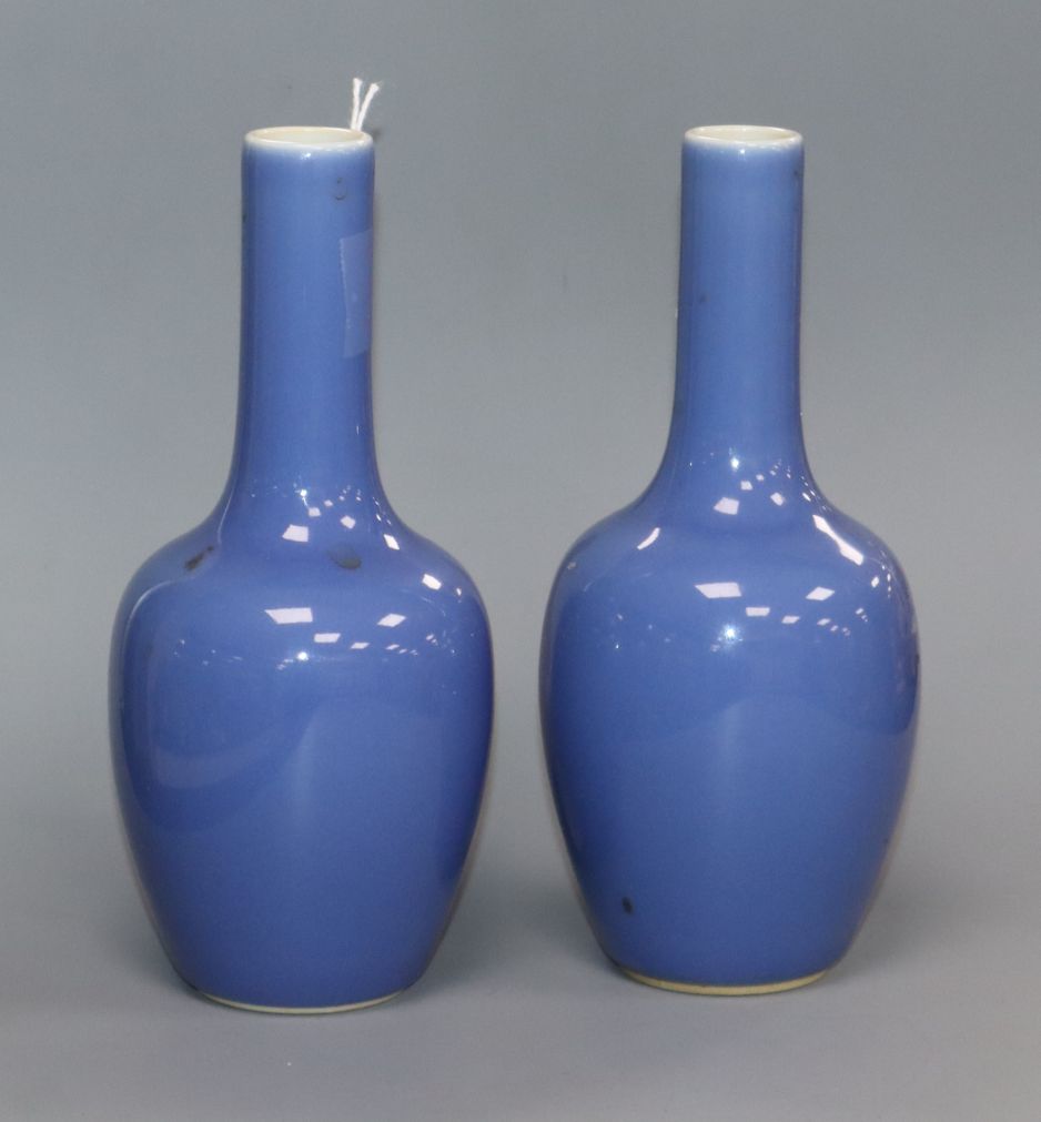 A pair of Chinese blue ground bottle vases