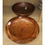 A Sam Fanaroff circular copper dish and an earlier embossed bowl largest diameter 42cm