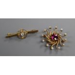 Two yellow metal and gem set brooches, largest 42mm.