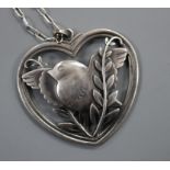 A Georg Jensen sterling 'robin and wheatsheaf' heart shaped pendant, no. 97, on fine link chain,